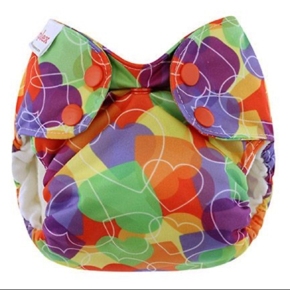 Newborn simplex in organic cotton gently used in Rainbow Hearts